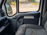 a view of the inside of a vehicle from the driver ' s seat