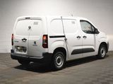 a white van that is parked in a room