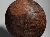 an image of a wooden ball with a design on it