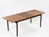 a close up of a wooden table with a white background