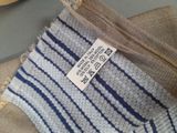 a close up of a piece of cloth with a tag on it