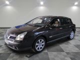 a picture of a black car parked in a showroom