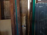 several pieces of wood are stacked on top of each other in a room
