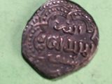 an old coin that has been found on a table