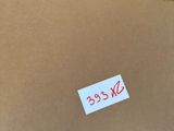 an open box with a sticker on it sitting on top of a table