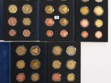 a collection of coins from different countries including the united states