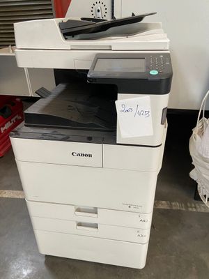 a printer that is sitting on top of a table