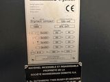 a sign on the door of a machine that says demag