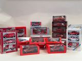 a lot of toy cars that are sitting on a table