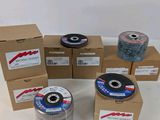 a bunch of different types of grinding discs on a table