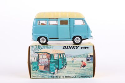 a toy van that is sitting on top of a box