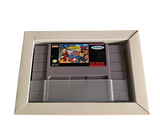 a nintendo game in a white box on a white surface