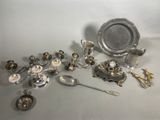 a lot of silver items that are on the table