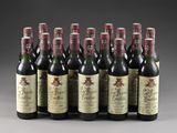 six bottles of wine are lined up in a row