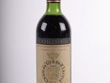 a bottle of wine that is sitting on a table
