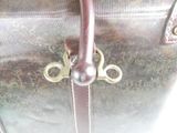 a close up of a piece of luggage with a handle