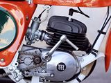 a motorcycle that is parked on the side of the street