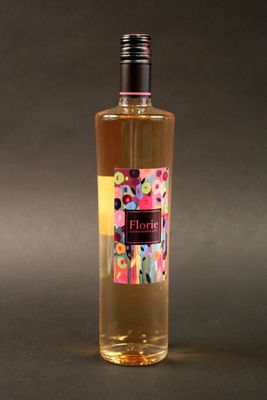 a bottle of wine that is sitting on a table