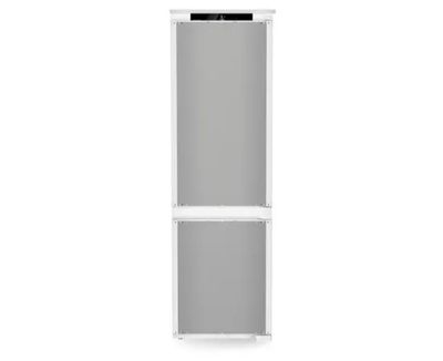 une photo d'une grande armoire blanche avec une porte vitrée