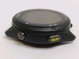 a close up of a smart watch on a white surface