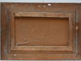 an old wooden picture frame with a hole in the middle
