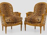 paire de fauteuils à imprimé léopard dans le style Louis II