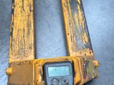 a close up of a fork on a forklift