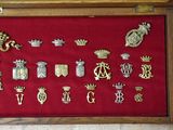 a display case with a lot of badges on it