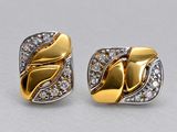 two tone gold and silver earrings with diamonds