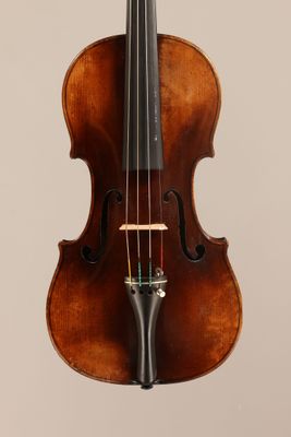 a close up of a violin with a bow on a white background