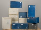 several boxes stacked on top of each other on a table