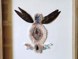 une photo d'une photo d'un oiseau dans un cadre photo