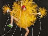 an image of a magazine cover with a woman dressed as a chicken