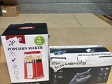 two boxes of popcorn maker sitting on top of a wooden table