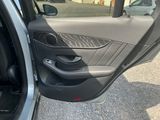 a car door with the door handle open and the door handle open