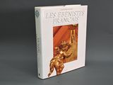 une image représentant un livre surmonté d'une statue en or
