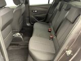 the back seats of a car with a seat belt in the back