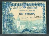 un ancien billet de banque français avec l'image d'un château en arrière-plan