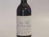 a bottle of wine that is sitting on a table