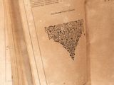 an open book with a drawing of a heart on it