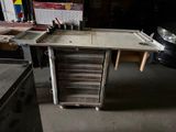 a workbench in a garage with tools on it