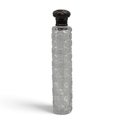 a glass bottle with a black lid on a white background