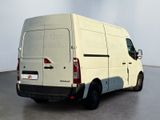 a white van that is parked in a room