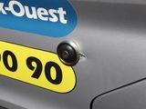 a close up of a car with a sticker on it