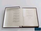 an open book that is sitting on a table