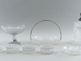 a lot of glass items that are on the table