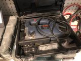 a tool in a case with wires and wires in it
