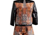 an orange and black jacket and shorts are on a mannequin mannequin mannequin mannequin mannequin mannequin mannequin mann
