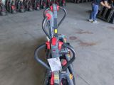 a lot of bikes that are parked in a warehouse