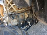 a close up of a motorcycle with a tire on the ground